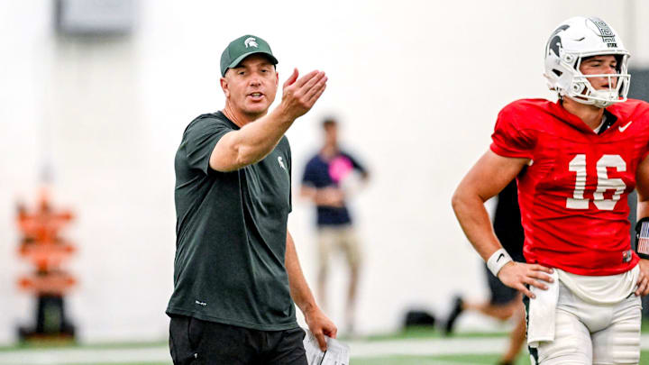 Michigan State's offensive coordinator Brian Lindgren works with the team during camp on Monday, Aug. 5, 2024, at the indoor practice facility in East Lansing.