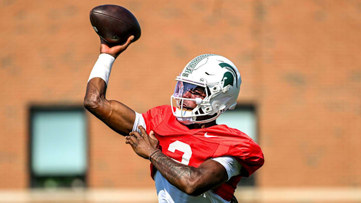 Michigan State's Aidan Chiles throws a pass during football practice on Monday, Aug. 11, 2025, in East Lansing.