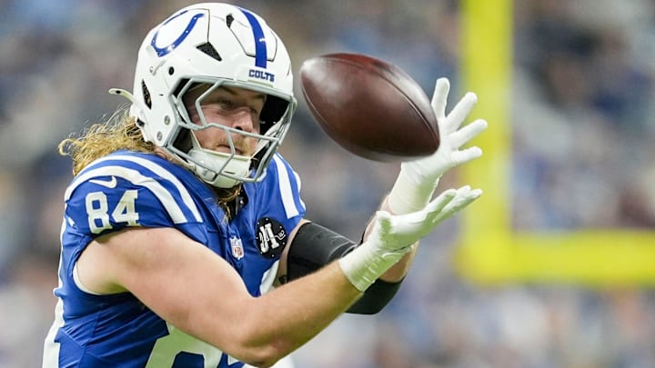 Indianapolis Colts tight end Tyler Warren (84) pulls in a catch for a first down Sunday, Dec. 28, 2025, during a game against the Jacksonville Jaguars at Lucas Oil Stadium in Indianapolis.
