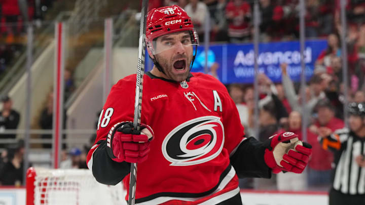 Oct 30, 2025; Raleigh, North Carolina, USA;  Carolina Hurricanes left wing Jordan Martinook (48) celebrates his goal against the New York Islanders during the first period at Lenovo Center. Mandatory Credit: James Guillory-Imagn Images