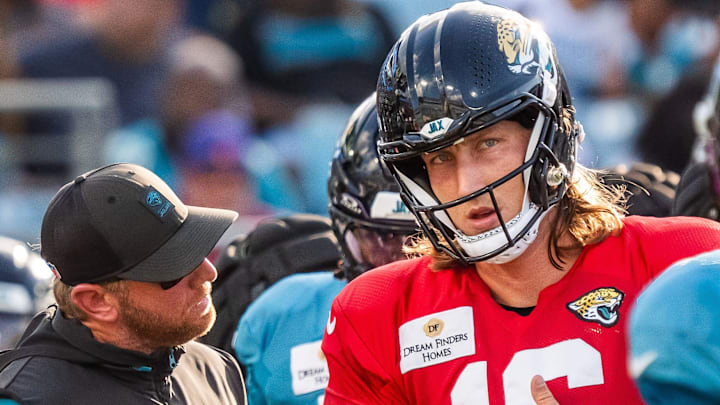 Jacksonville Jaguars head coach Liam Coen talks with Jacksonville Jaguars quarterback Trevor Lawrence (16) between plays before an NFL scrimmage at EverBank Stadium Friday August 1, 2025, in Jacksonville, Fla. [Doug Engle/Florida Times-Union]