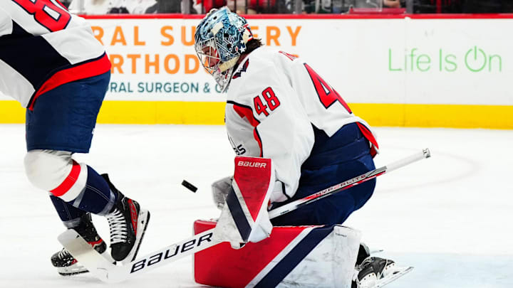 Apr 2, 2025; Raleigh, North Carolina, USA; Washington Capitals goaltender Logan Thompson (48) stops a shot against the Carolina Hurricanes during the first period at Lenovo Center. Mandatory Credit: James Guillory-Imagn Images Apr 2, 2025; Raleigh, North Carolina, USA; Washington Capitals goaltender Logan Thompson (48) stops a shot against the Carolina Hurricanes during the first period at Lenovo Center. Mandatory Credit: James Guillory-Imagn Images