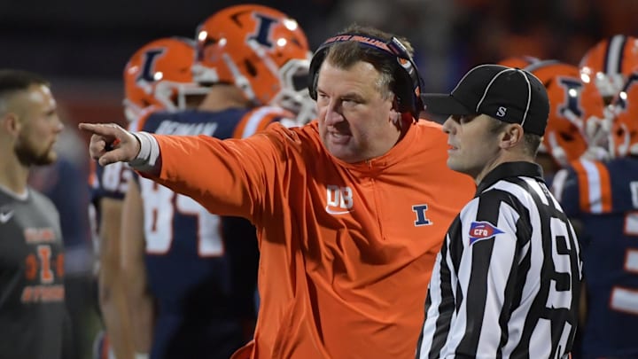 Oct 6, 2023; Champaign, Illinois, USA; Illinois Fighting Illini head coach Bret Bielema talks with an official during the first half against the Nebraska Cornhuskers at Memorial Stadium. Mandatory Credit: Ron Johnson-USA TODAY Sports