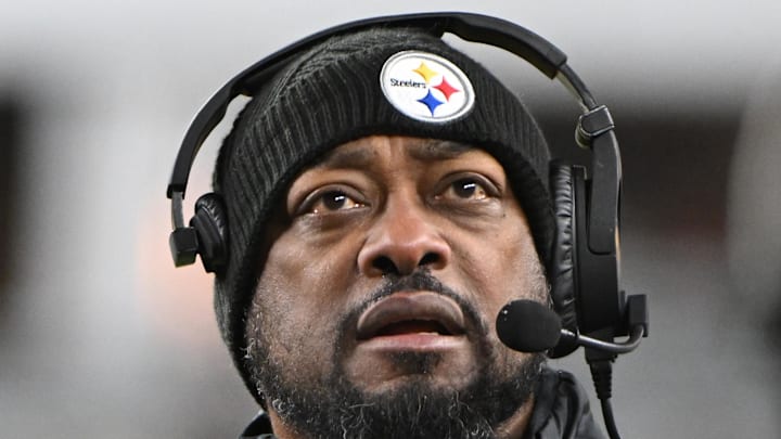 Jan 4, 2025; Pittsburgh, Pennsylvania, USA; Pittsburgh Steelers head coach Mike Tomlin looks at the scoreboard against the Cincinnati Bengals during the second quarter at Acrisure Stadium. Mandatory Credit: Barry Reeger-Imagn Images