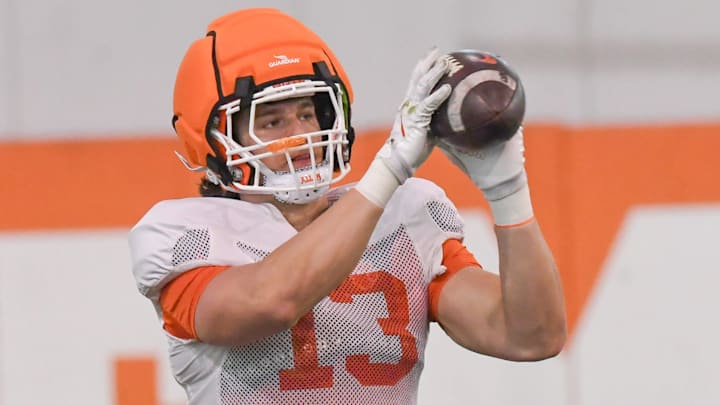 Clemson defensive end Will Heldt (13) catches a ball during the football practice at the Allen N. Reeves Football Complex at Clemson University in Clemson, S.C. Wednesday, March 5, 2025.