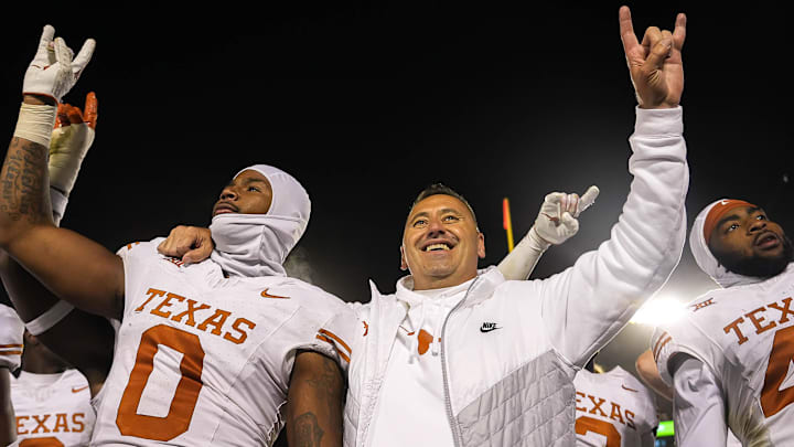 Texas Longhorns head coach Steve Sarkisian and linebacker Anthony Hill Jr. (0), Nov. 18, 2023 at Jack Trice Stadium in Ames, Iowa. Texas Longhorns head coach Steve Sarkisian and linebacker Anthony Hill Jr. (0), Nov. 18, 2023 at Jack Trice Stadium in Ames, Iowa.