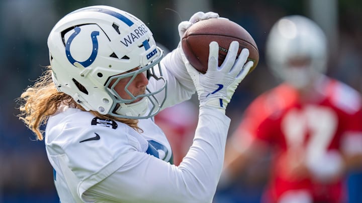 Indianapolis Colts tight end Tyler Warren (84) catches a pass Friday, July 25, 2025, during training camp held at Grand Park in Westfield. Indianapolis Colts tight end Tyler Warren (84) catches a pass Friday, July 25, 2025, during training camp held at Grand Park in Westfield.