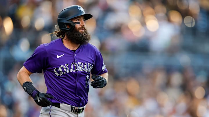Aug 2, 2024; San Diego, California, USA;  Colorado Rockies designated hitter Charlie Blackmon (19) runs to first base after drawing a walk during the first inning against the San Diego Padres at Petco Park.
