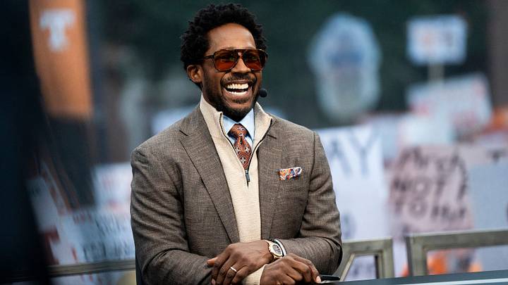 Desmond Howard laughs as fans chant a profane chant relating to Lane Kiffin during ESPN's College GameDay show held outside of Ayres Hall on the University of Tennessee campus in Knoxville, Tenn. on Sept. 26, 2026.