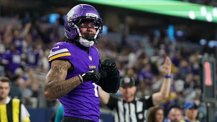Dec 14, 2025; Arlington, Texas, USA; Minnesota Vikings wide receiver Jalen Nailor (1) celebrates after a touchdown catch during the second half against the Dallas Cowboys at AT&T Stadium.