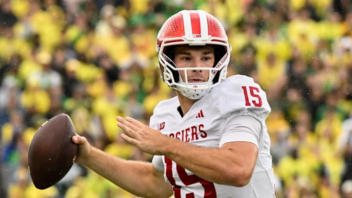 Oct 11, 2025; Eugene, Oregon, USA; Indiana Hoosiers quarterback Fernando Mendoza (15) prepares to throw the ball against the Oregon Ducks during the fourth quarter at Autzen Stadium. Mandatory Credit: Troy Wayrynen-Imagn Images