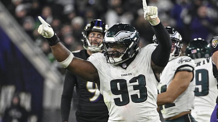 Dec 1, 2024; Baltimore, Maryland, USA; Philadelphia Eagles defensive tackle Milton Williams (93) celebrates as Baltimore Ravens place kicker Justin Tucker (9) reacts to missing a second half field goal at M&T Bank Stadium. Dec 1, 2024; Baltimore, Maryland, USA; Philadelphia Eagles defensive tackle Milton Williams (93) celebrates as Baltimore Ravens place kicker Justin Tucker (9) reacts to missing a second half field goal at M&T Bank Stadium.