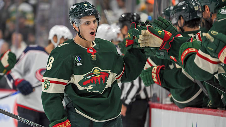 Oct 11, 2025; Saint Paul, Minnesota, USA;  Minnesota Wild defensemen Zeev Buium (8) celebrates his first career goal, a power play tally against the Columbus Blue Jackets during the third period at Grand Casino Arena. Mandatory Credit: Nick Wosika-Imagn Images