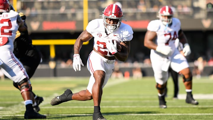 Oct 5, 2024; Nashville, Tennessee, USA;  Alabama Crimson Tide running back Jam Miller (26) runs the ball for a touchdown against the Vanderbilt Commodores during the first half at FirstBank Stadium. Mandatory Credit: Steve Roberts-Imagn Images