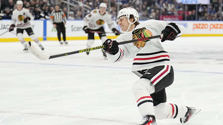 Dec 2, 2024; Toronto, Ontario, CAN; Chicago Blackhawks forward Connor Bedard (98) shoots the puck against the Toronto Maple Leafs during the second period at Scotiabank Arena. Mandatory Credit: John E. Sokolowski-Imagn Images Dec 2, 2024; Toronto, Ontario, CAN; Chicago Blackhawks forward Connor Bedard (98) shoots the puck against the Toronto Maple Leafs during the second period at Scotiabank Arena. Mandatory Credit: John E. Sokolowski-Imagn Images