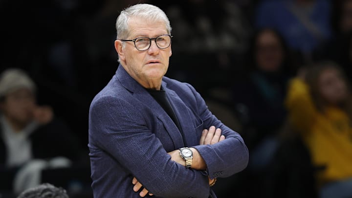 Dec 20, 2025; Brooklyn, New York, USA; UConn Huskies head coach Geno Auriemma stands on the court during the first half against the Iowa Hawkeyes at Barclays Center. Mandatory Credit: Pamela Smith-Imagn Images