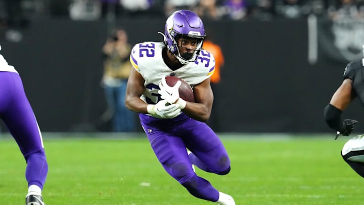 Dec 10, 2023; Paradise, Nevada, USA; Minnesota Vikings running back Ty Chandler (32) gains yardage