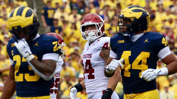 Oklahoma defensive end Taylor Wein walks back to the sideline during the first half against the Michigan Wolverines.