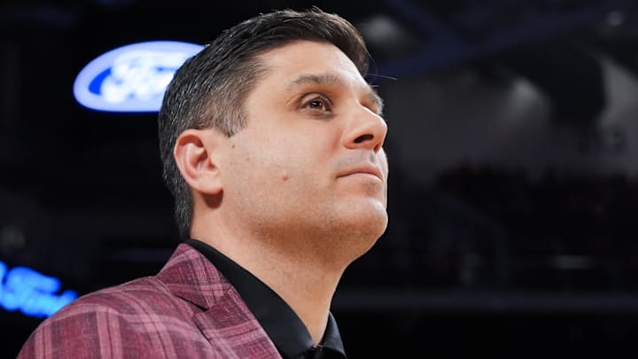 Mar 3, 2026; Cincinnati, Ohio, USA;  Cincinnati Bearcats head coach Wes Miller stands on the court as his team’s senior players are honored before the game against the BYU Cougars at Fifth Third Arena. Mandatory Credit: Aaron Doster-Imagn Images