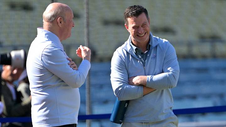 Apr 28, 2026; Los Angeles, California, USA; Los Angeles Dodgers President and CEO Stan Kasten talks with Andrew Friedman, President of Baseball Operations, prior to the game against the Miami Marlins at Dodger Stadium. Mandatory Credit: Jayne Kamin-Oncea-Imagn Images