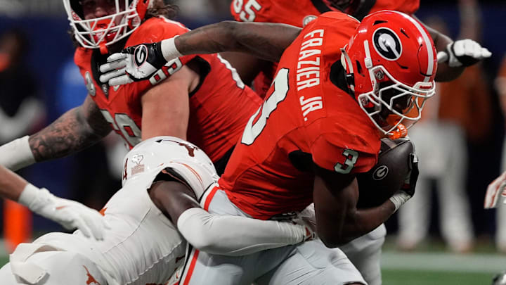 Georgia running back Nate Frazier (3) moves the ball during the first half of the SEC championship game against Texas in Atlanta, on Saturday, Dec. 7, 2024.