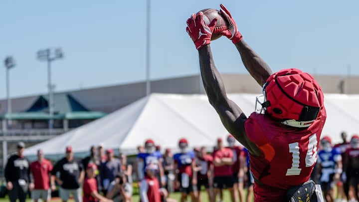 Oklahoma freshman Elijah Thomas hauls in a catch during fall camp. Oklahoma freshman Elijah Thomas hauls in a catch during fall camp.