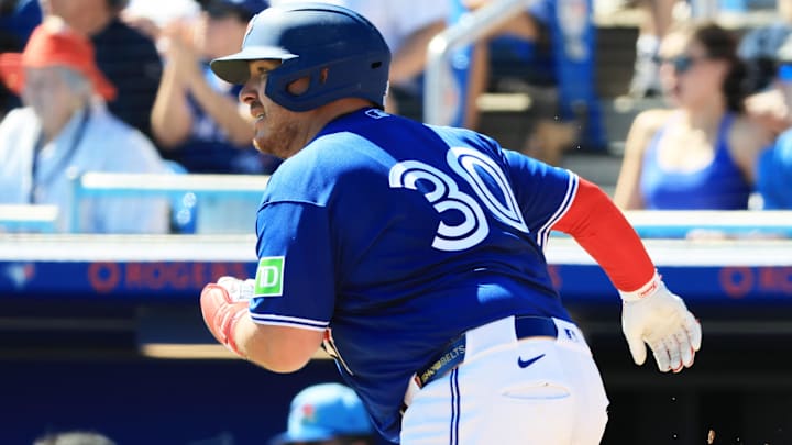 Feb 21, 2026; Dunedin, Florida, USA; Toronto Blue Jays catcher Alejandro Kirk (30) singles during the first inning against the Philadelphia Phillies  at TD Ballpark. Mandatory Credit: Kim Klement Neitzel-Imagn Images