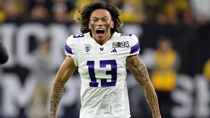 Jan 8, 2024; Houston, TX, USA; Washington Huskies cornerback Kamren Fabiculanan (13) reacts after a play against the Michigan Wolverines during the third quarter in the 2024 College Football Playoff national championship game at NRG Stadium. Mandatory Credit: Thomas Shea-USA TODAY Sports