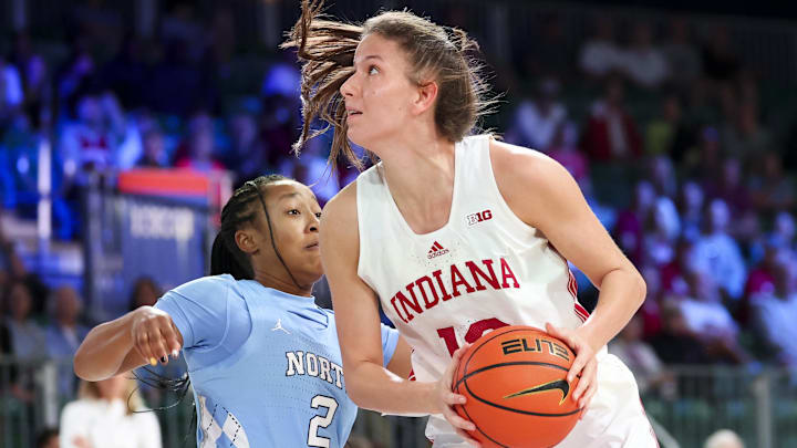 Indiana Hoosiers guard Yarden Garzon (12) looks to score as North Carolina Tar Heels guard Grace Townsend (2) defends during the first half at the Atlantis Resort.