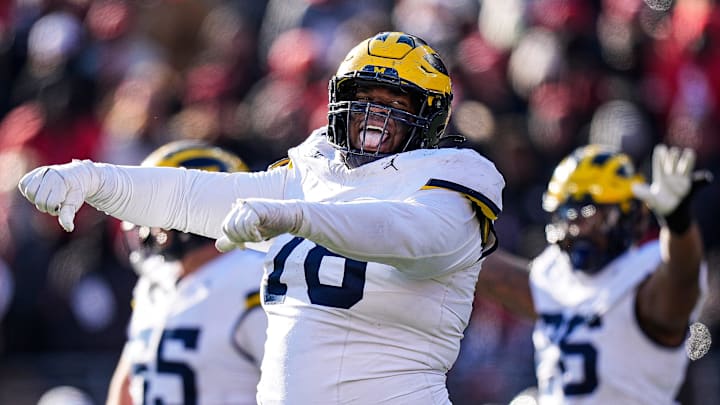 Michigan defensive lineman Kenneth Grant (78) celebrates after Ohio State misses a field goal. Michigan defensive lineman Kenneth Grant (78) celebrates after Ohio State misses a field goal.