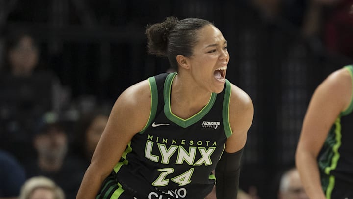 Sep 11, 2025; Minneapolis, Minnesota, USA; Minnesota Lynx forward Napheesa Collier (24) celebrates making a three point shot against the Golden State Valkyries in the first half at Target Center. Mandatory Credit: Jesse Johnson-Imagn Images
