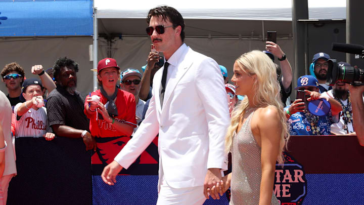 Pittsburgh Pirates pitcher Paul Skenes walks the red carpet with LSU gymnast and girlfriend Livvy Dunne before the 2024 MLB All-Star game at Globe Life Field.