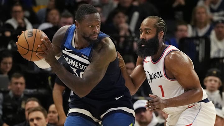 Jan 6, 2025; Minneapolis, Minnesota, USA; Los Angeles Clippers guard James Harden (1) defends against Minnesota Timberwolves forward Julius Randle (30) in the third quarter at Target Center.