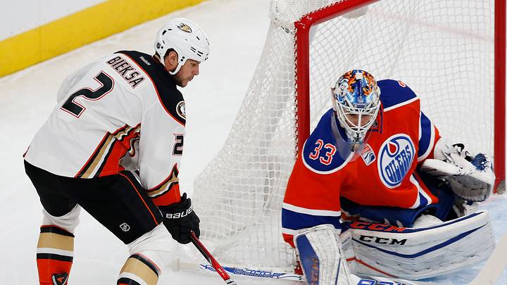 Dec 3, 2016; Edmonton, Alberta, CAN; Former Edmonton Oilers goaltender Cam Talbot (33) makes a save on Anaheim Ducks defensemen Kevin Bieksa (2) during the first period at Rogers Place. Mandatory Credit: Perry Nelson-USA TODAY Sports