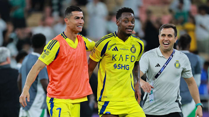 [US, Mexico & Canada customers only] Feb 13, 2024; Jeddah, Saudi Arabia;  Al Nassr players Jhon Duran and Cristiano Ronaldo celebrate after a Saudi Pro League soccer match at King Abdullah Sports City. Mandatory Credit: Reuters via Imagn Images