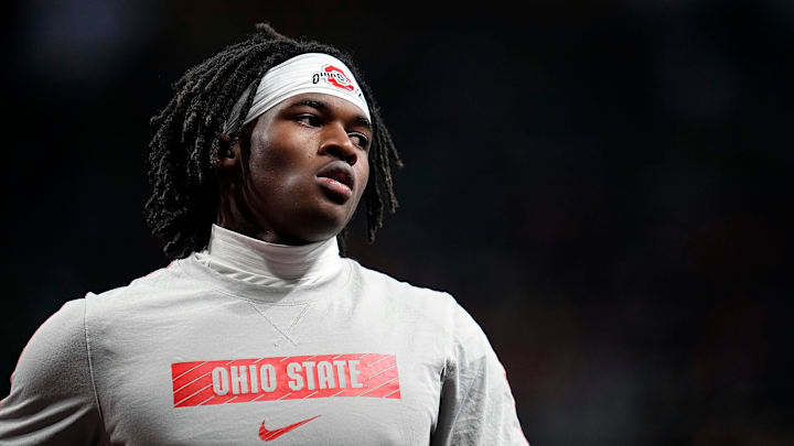Ohio State Buckeyes wide receiver Jeremiah Smith (4) warm ups before the start of the College Football Playoff National Championship at Mercedes-Benz Stadium in Atlanta on January 20, 2025.