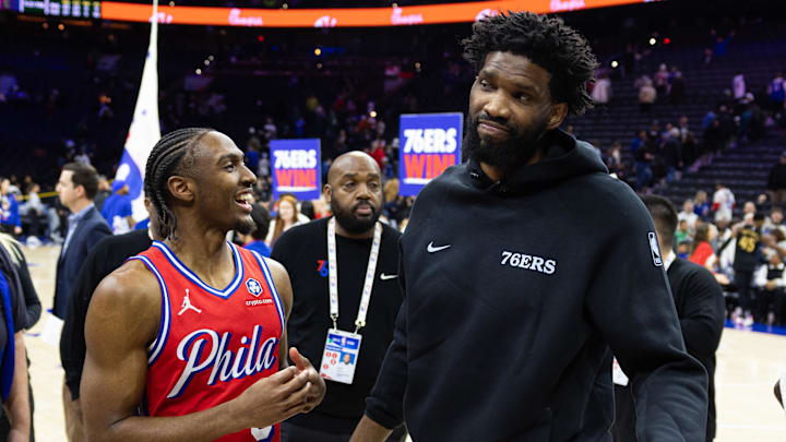 Jan 24, 2025; Philadelphia, Pennsylvania, USA; Philadelphia 76ers guard Tyrese Maxey (L) reacts with injured Joel Embiid (R) after a victory against the Cleveland Cavaliers at Wells Fargo Center. Mandatory Credit: Bill Streicher-Imagn Images Jan 24, 2025; Philadelphia, Pennsylvania, USA; Philadelphia 76ers guard Tyrese Maxey (L) reacts with injured Joel Embiid (R) after a victory against the Cleveland Cavaliers at Wells Fargo Center. Mandatory Credit: Bill Streicher-Imagn Images