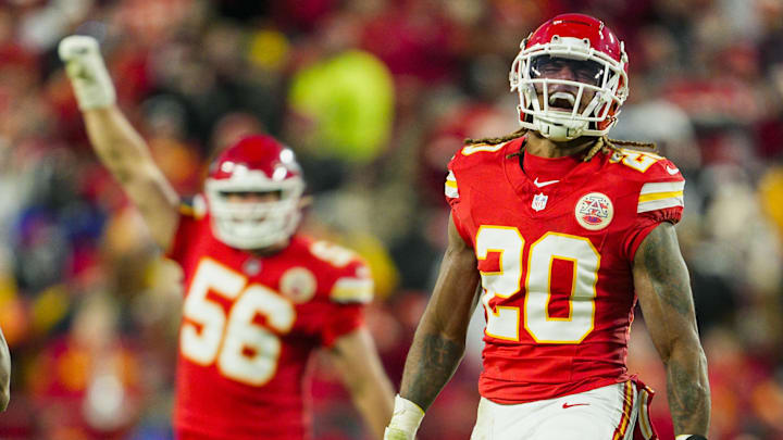 Nov 29, 2024; Kansas City, Missouri, USA; Kansas City Chiefs safety Justin Reid (20) and defensive end George Karlaftis (56) celebrate after a play during the second half against the Las Vegas Raiders at GEHA Field at Arrowhead Stadium. Mandatory Credit: Jay Biggerstaff-Imagn Images