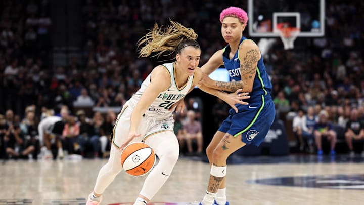 Aug 16, 2025; Minneapolis, Minnesota, USA; New York Liberty guard Sabrina Ionescu (20) works around Minnesota Lynx guard Natisha Hiedeman (2) during the first quarter at Target Center. Mandatory Credit: Matt Krohn-Imagn Images Aug 16, 2025; Minneapolis, Minnesota, USA; New York Liberty guard Sabrina Ionescu (20) works around Minnesota Lynx guard Natisha Hiedeman (2) during the first quarter at Target Center. Mandatory Credit: Matt Krohn-Imagn Images