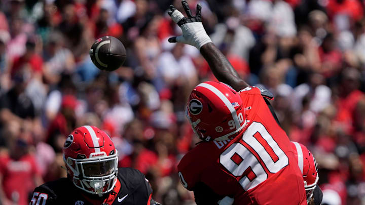 Georgia defensive lineman Elijah Griffin (90) goes up to bat down a pass during the Georgia G-Day spring football game in Athens, Ga., on Saturday, April 12, 2025.