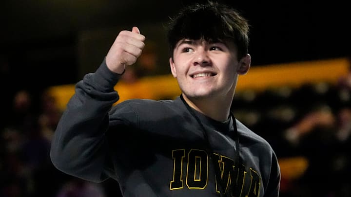 Iowa wrestling commit Bo Bassett gives a thumbs up to the crowd during the ÒFloWrestling Night in AmericaÓ event Wednesday, Feb. 26, 2025 at Xtream Arena in Coralville, Iowa.