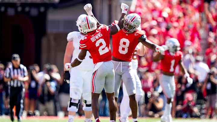 Ohio State Buckeyes safety Caleb Downs (2) and linebacker Arvell Reese (8) celebrate in the second half at Ohio Stadium on Saturday, Aug. 30, 2025 in Columbus, Ohio.