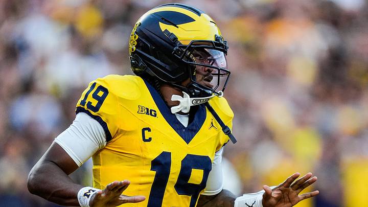 Michigan quarterback Bryce Underwood celebrates after scoring a touchdown against Western Michigan Michigan quarterback Bryce Underwood celebrates after scoring a touchdown against Western Michigan