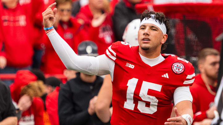 Nov 2, 2024; Lincoln, Nebraska, USA; Nebraska Cornhuskers quarterback Dylan Raiola (15) celebrates after a touchdown against the UCLA Bruins during the second quarter at Memorial Stadium. Mandatory Credit: Dylan Widger-Imagn Images