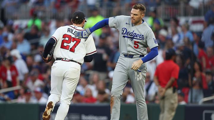 Oct 7, 2026; Cumberland, Georgia, USA; Los Angeles Dodgers first baseman Freddie Freeman (5) reacts with Atlanta Braves third baseman Austin Riley (27) during the third inning in game four of the NLDS for the 2026 MLB Playoffs at Truist Park. Mandatory Credit: Brett Davis-Imagn Images Oct 7, 2026; Cumberland, Georgia, USA; Los Angeles Dodgers first baseman Freddie Freeman (5) reacts with Atlanta Braves third baseman Austin Riley (27) during the third inning in game four of the NLDS for the 2026 MLB Playoffs at Truist Park. Mandatory Credit: Brett Davis-Imagn Images
