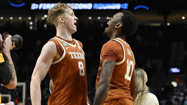 Mar 21, 2026; Portland, OR, USA; Texas Longhorns center Matas Vokietaitis (8) and forward Nic Codie (10) react after defeating the Gonzaga Bulldogs in the second round of the NCAA Tournament.