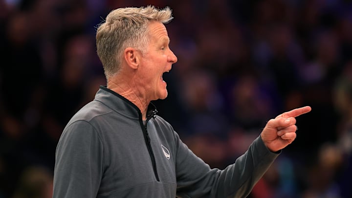 Apr 8, 2025; Phoenix, Arizona, USA; Golden State Warriors head coach Steve Kerr reacts against the Phoenix Suns during the first half at Footprint Center. Mandatory Credit: Mark J. Rebilas-Imagn Images