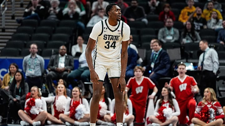 Michigan State forward Xavier Booker (34) reacts after a play against Wisconsin during the first half of Big Ten Tournament semifinal at Gainbridge Fieldhouse in Indianapolis, Ind. on Saturday, March 15, 2025.