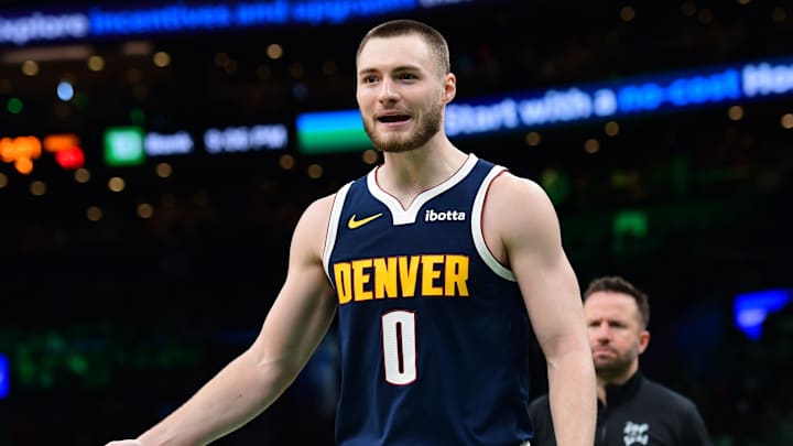 Jan 7, 2026; Boston, Massachusetts, USA; Denver Nuggets guard Christian Braun (0) reacts after a play during the second half against the Boston Celtics at TD Garden. Mandatory Credit: Bob DeChiara-Imagn Images