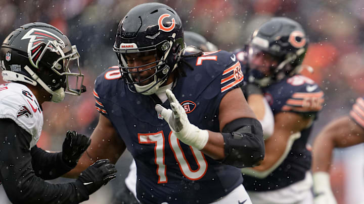 Dec 31, 2023; Chicago, Illinois, USA;  Chicago Bears offensive lineman Braxton Jones (70) blocks against the Atlanta Falcons at Soldier Field. Mandatory Credit: Jamie Sabau-Imagn Images